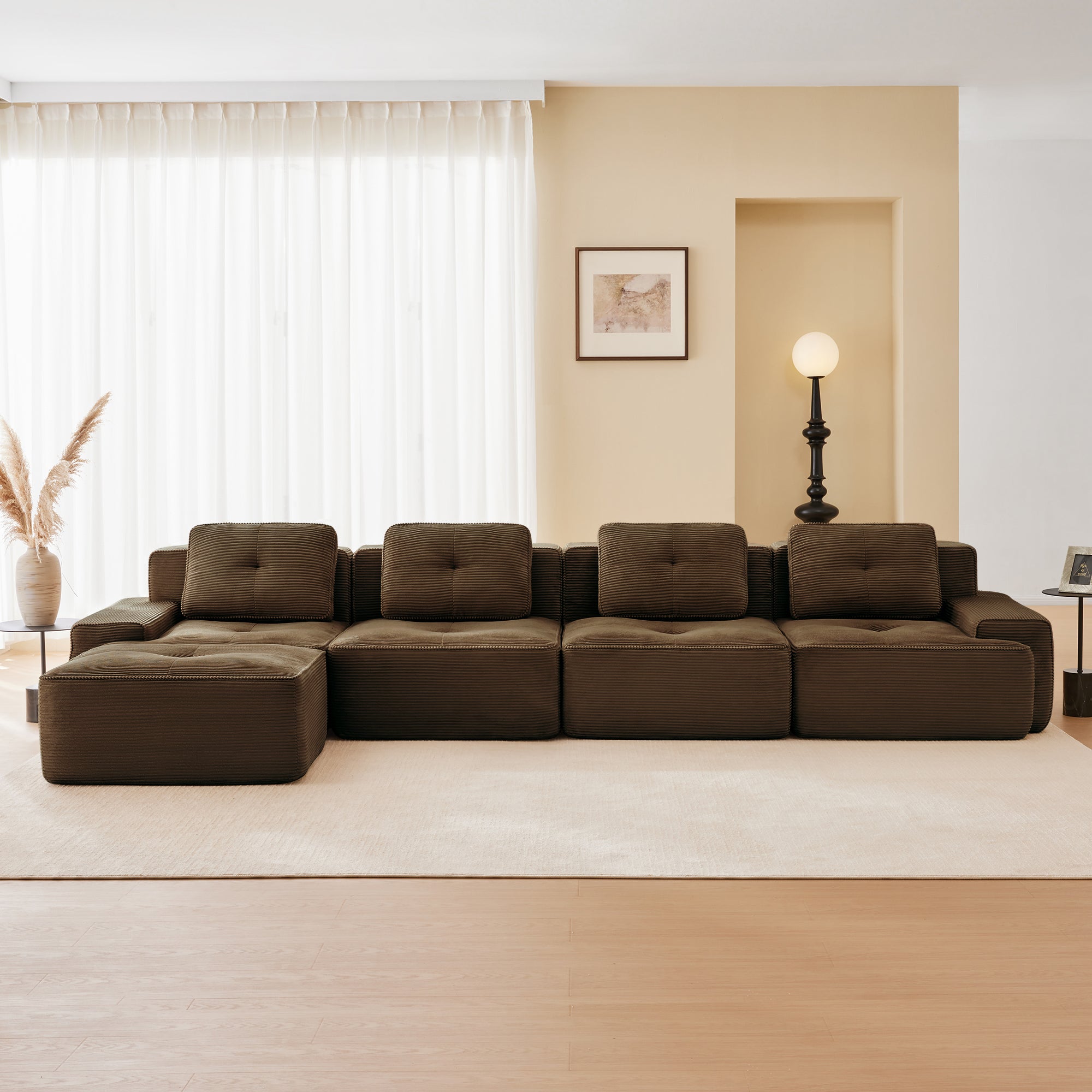 Racine brown modular sofa showing cozy living room setup with movable ottoman