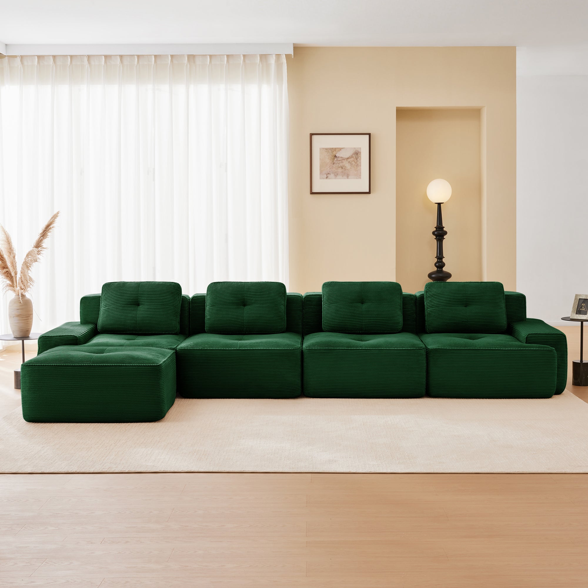 Racine green modular sofa showing bright living room setup with chaise ottoman