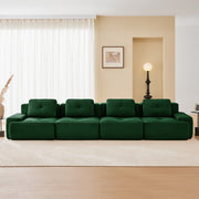 Racine green modular sofa showing front living room setup with two ottomans