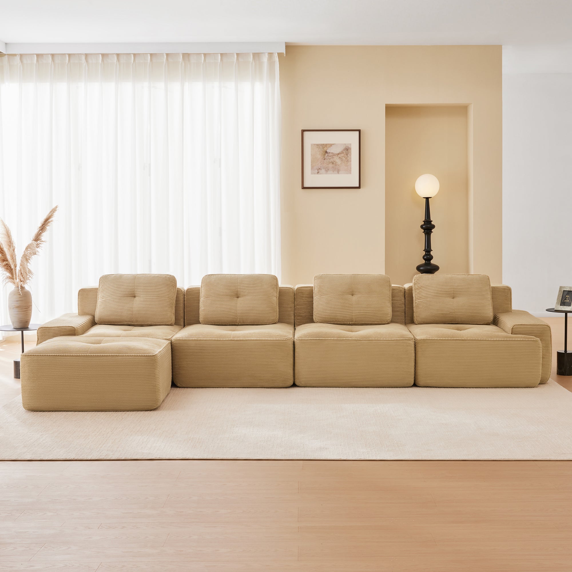 Racine light camel modular sofa showing front living room setup with movable ottoman