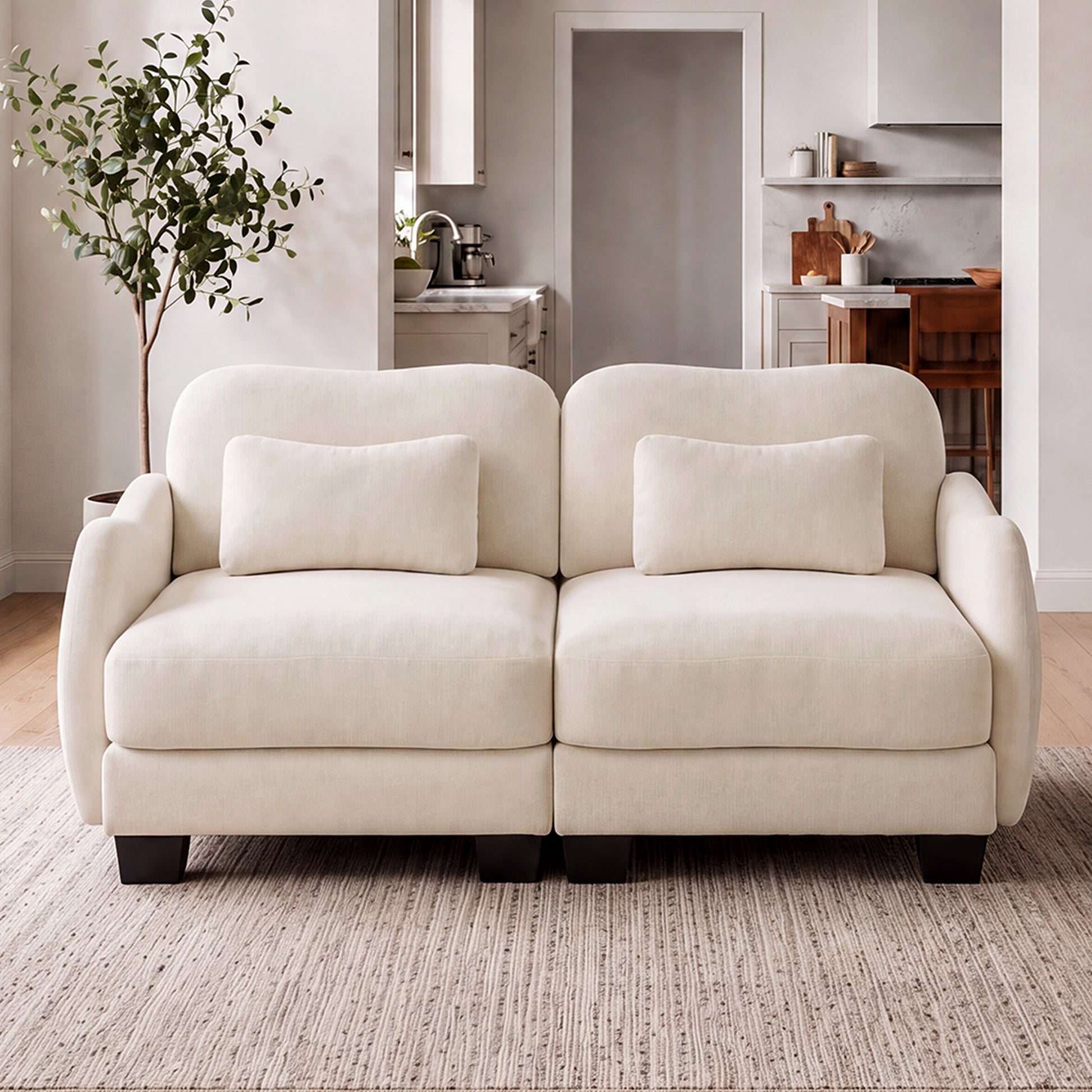 Rosedale beige loveseat sofa showing angled front view in a living room
