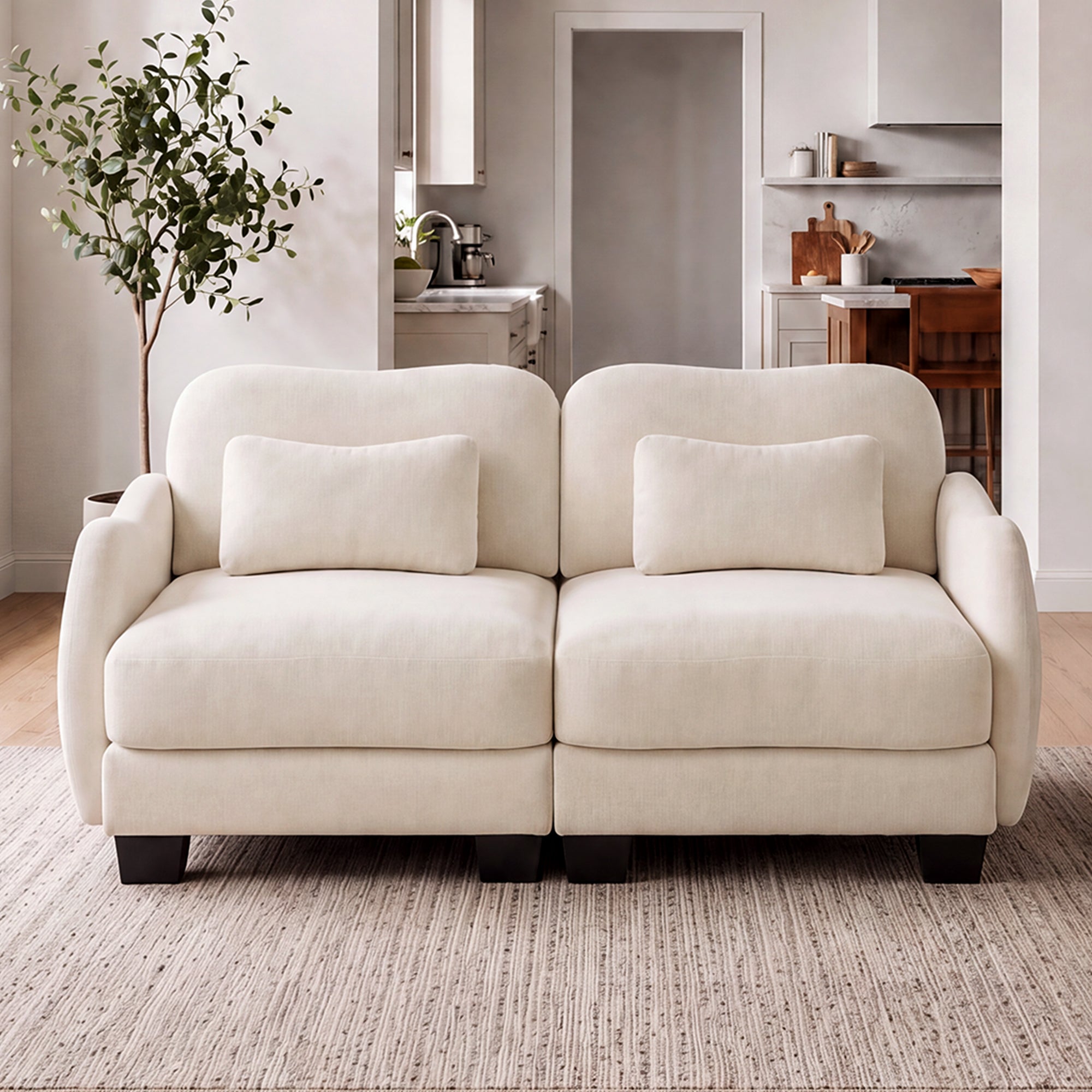 Rosedale beige loveseat sofa showing angled front view in a living room