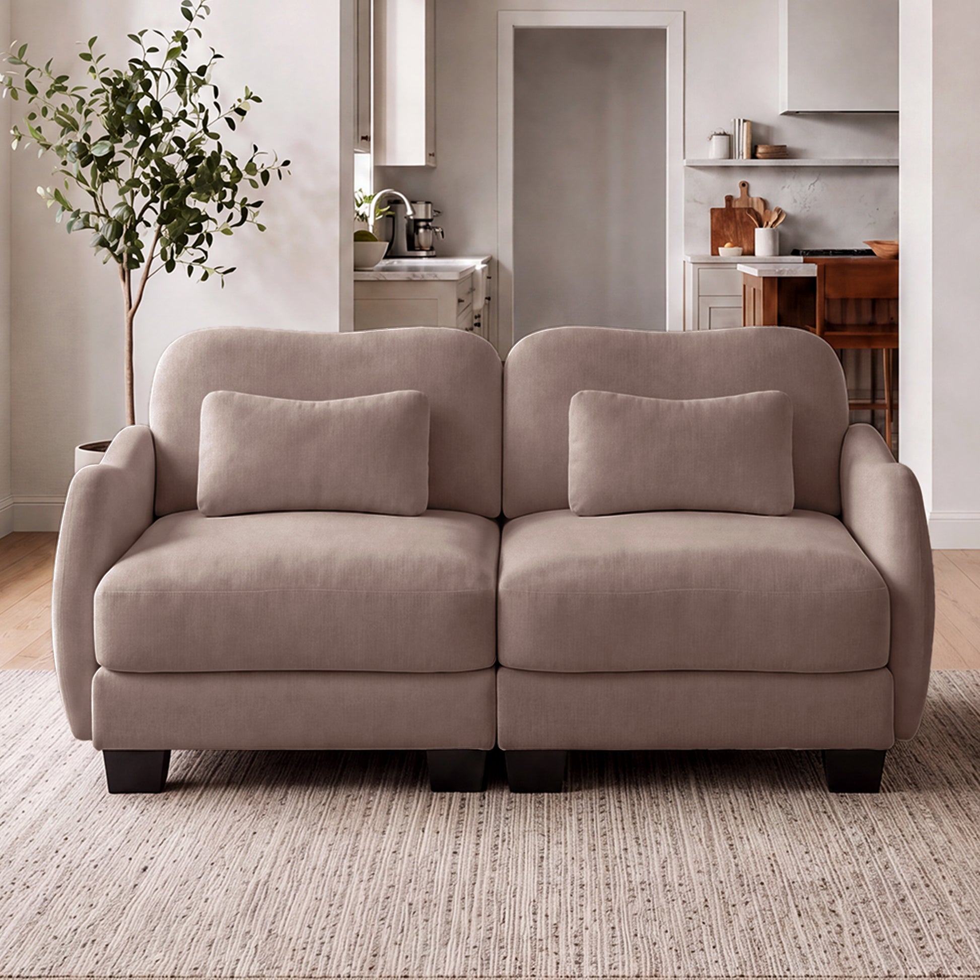 Rosedale brown gray loveseat sofa showing angled front view in a living room