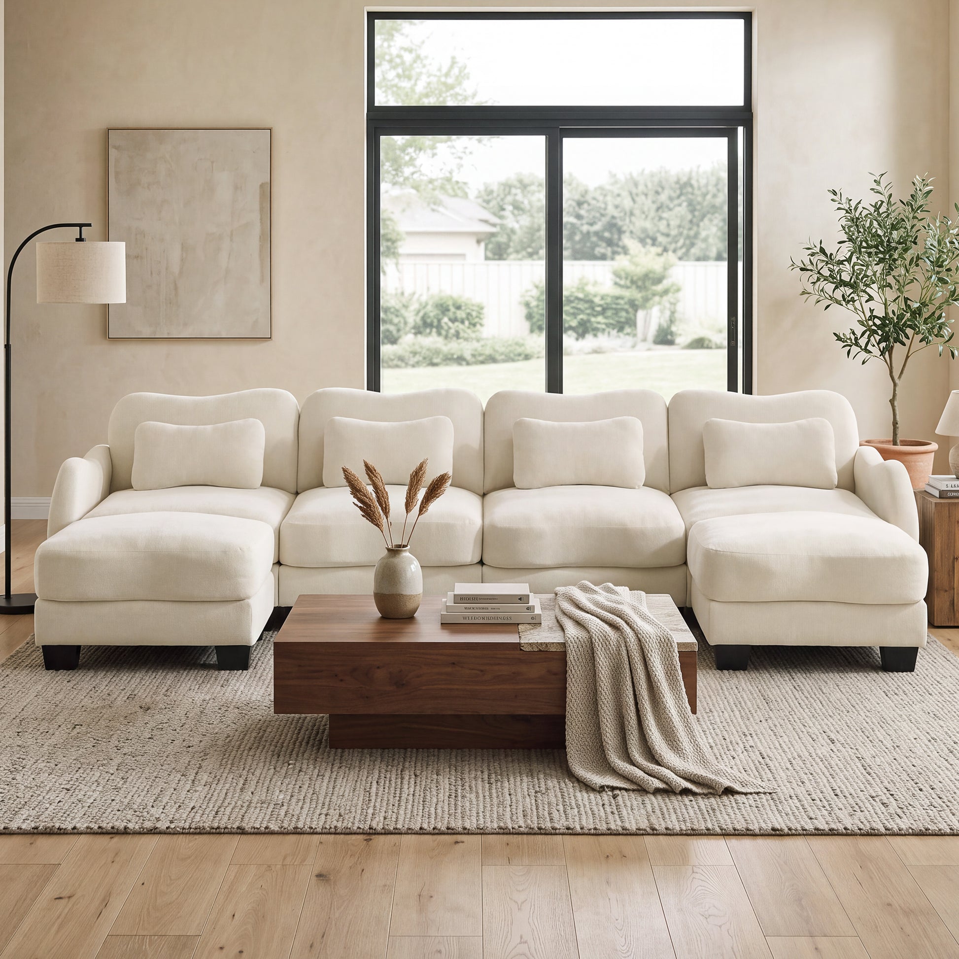 Rosedale beige sectional sofa shown in a bright living room with a wood coffee table and large windows