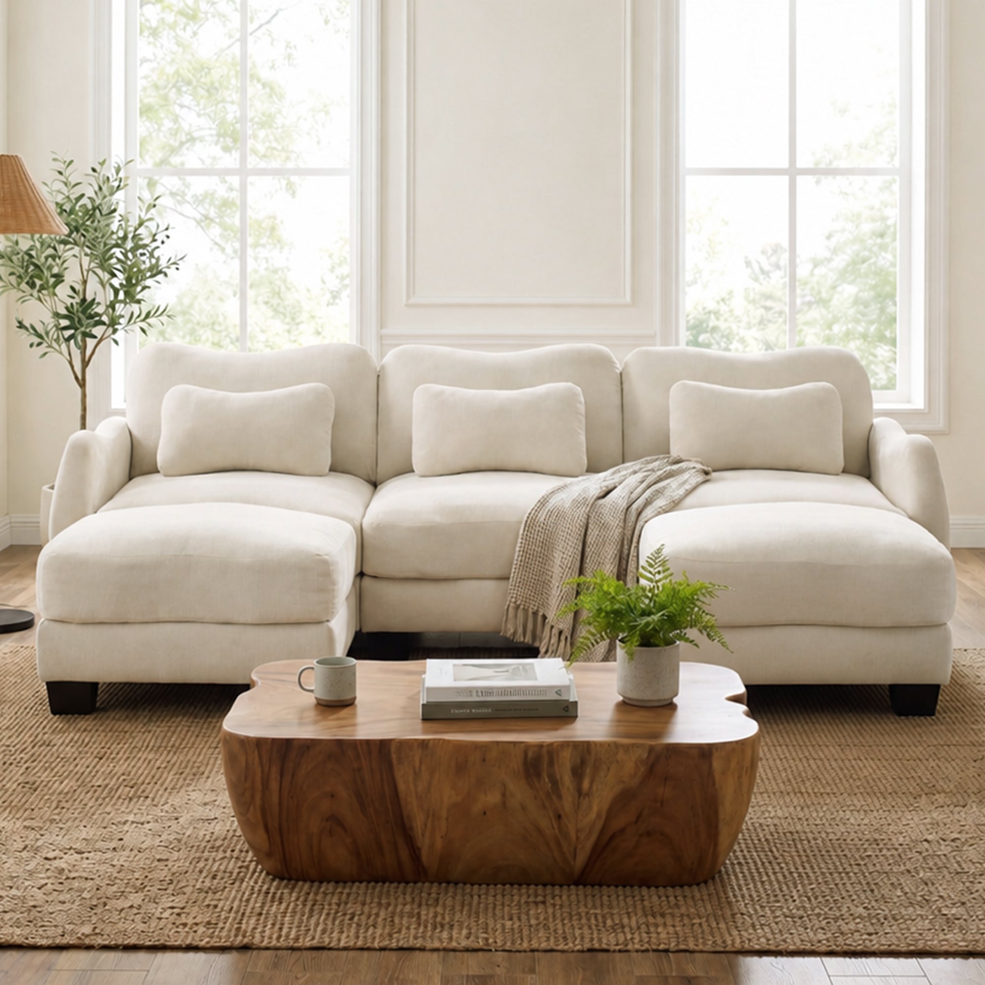 Rosedale beige sectional sofa showing a U-shaped modular layout with two ottomans and a wood coffee table