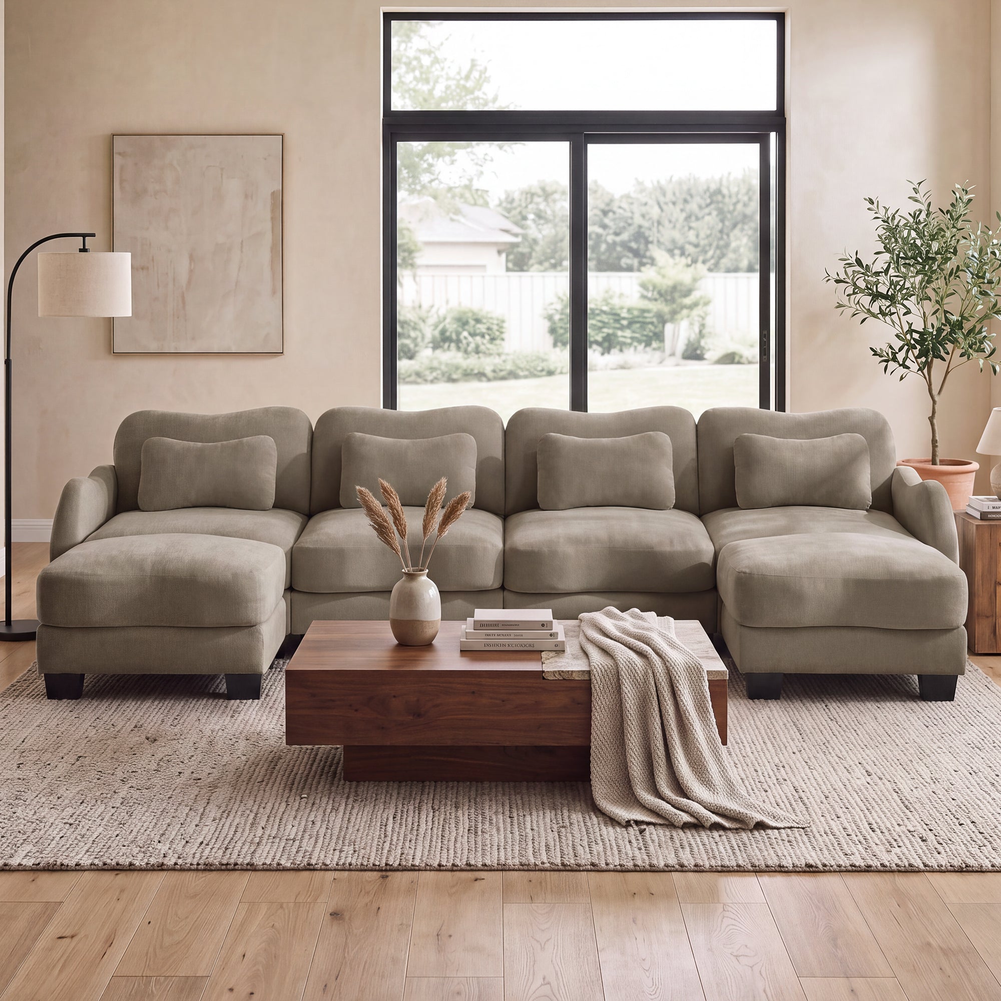 Rosedale brown sectional sofa shown in a bright living room with a wood coffee table and large windows