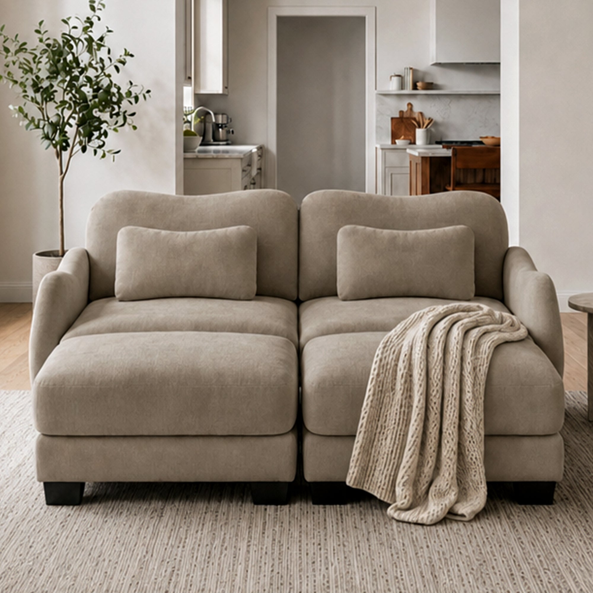 Rosedale brown sectional sofa showing a four-piece modular layout with two ottomans in a bright living room