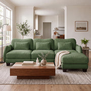 Rosedale green sectional sofa showing an L-shaped modular layout with ottoman in a bright living room