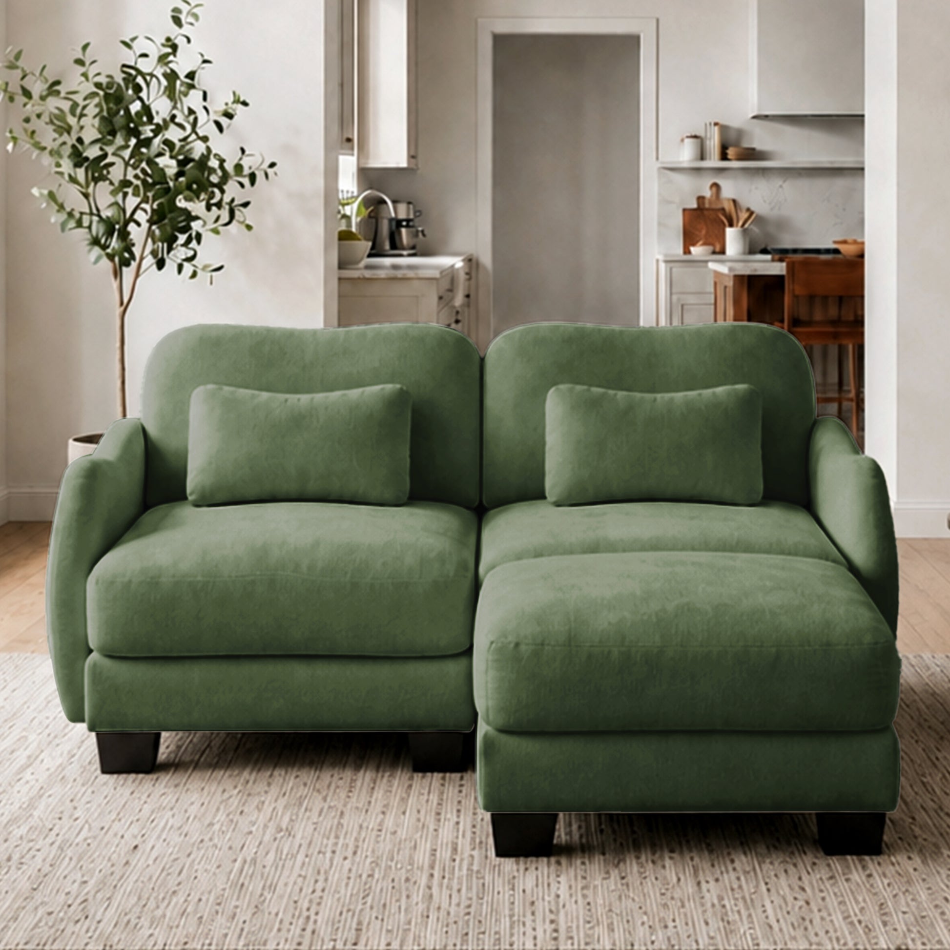 Rosedale green sectional sofa showing an L-shaped modular layout with ottoman in a bright living room