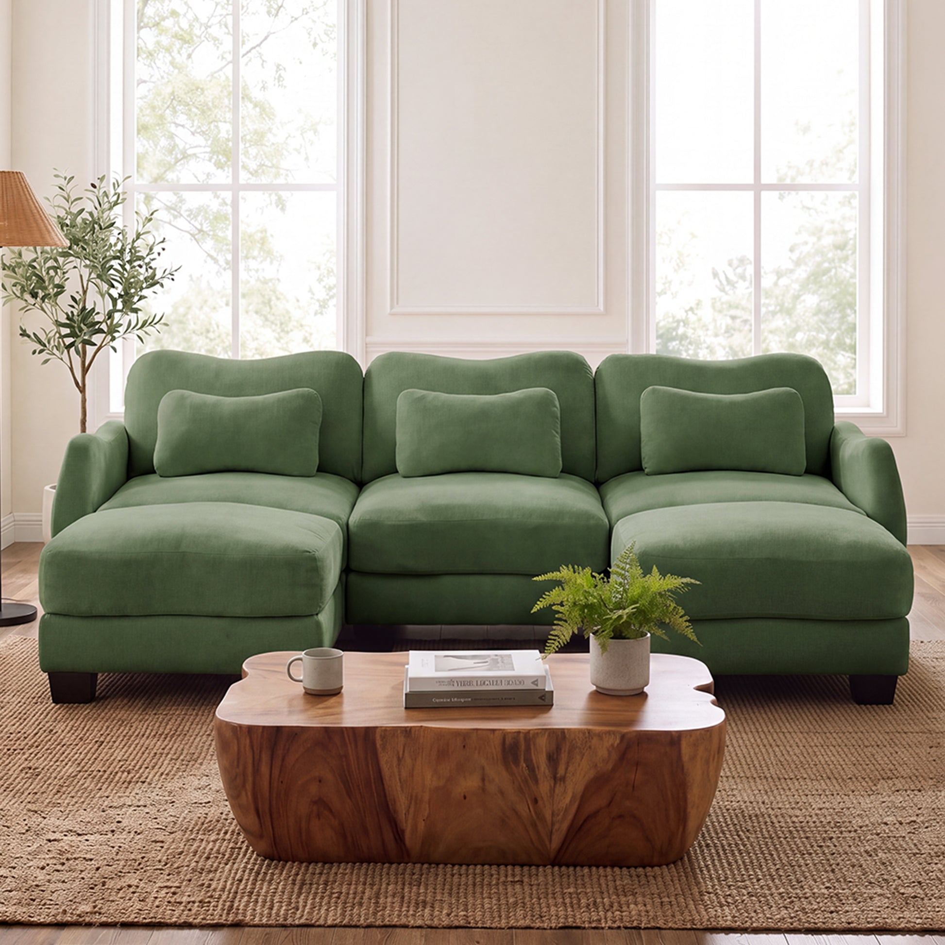 Rosedale green sectional sofa showing a U-shaped modular layout with two ottomans and a wood coffee table