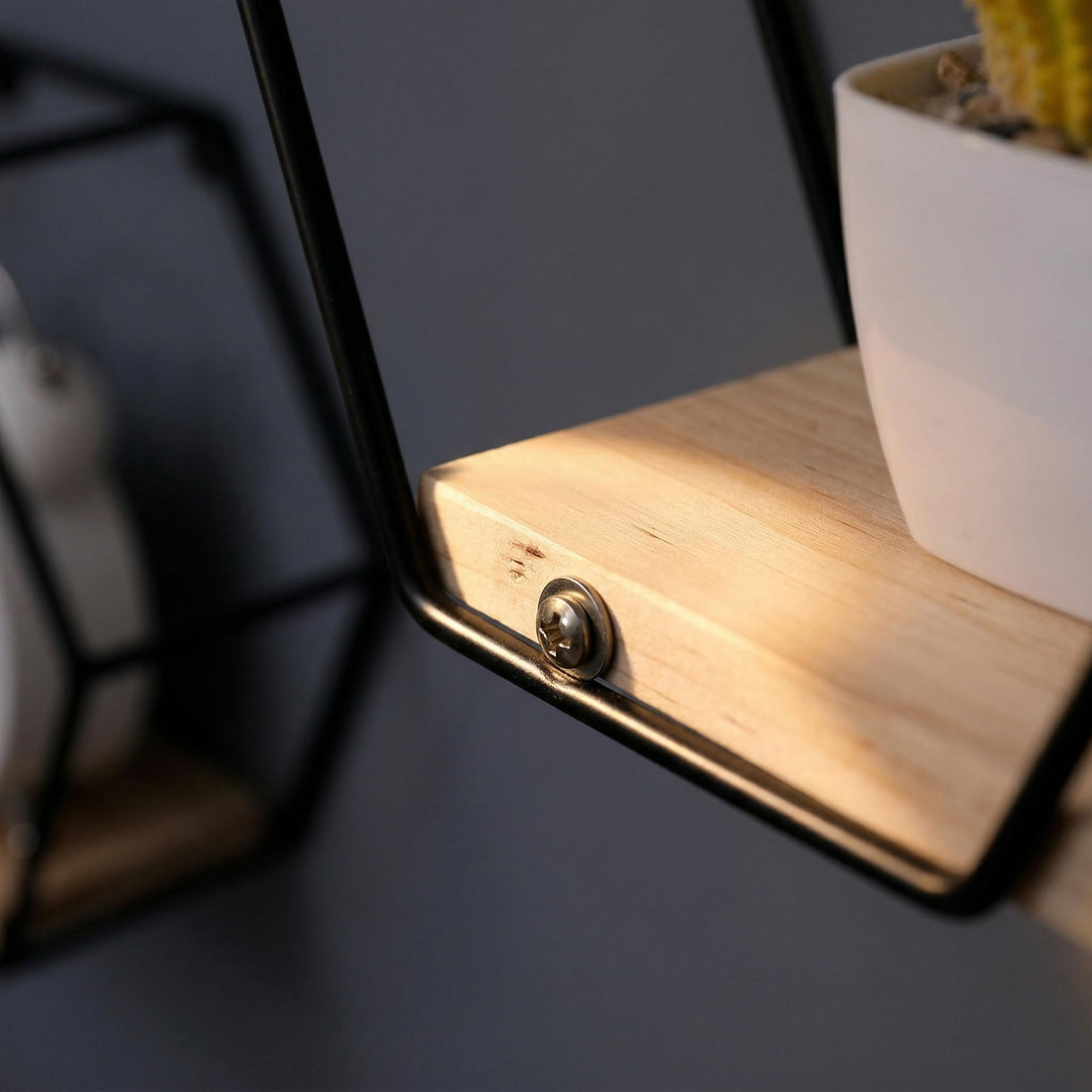Sage natural floating shelves showing wood shelf and black metal frame detail