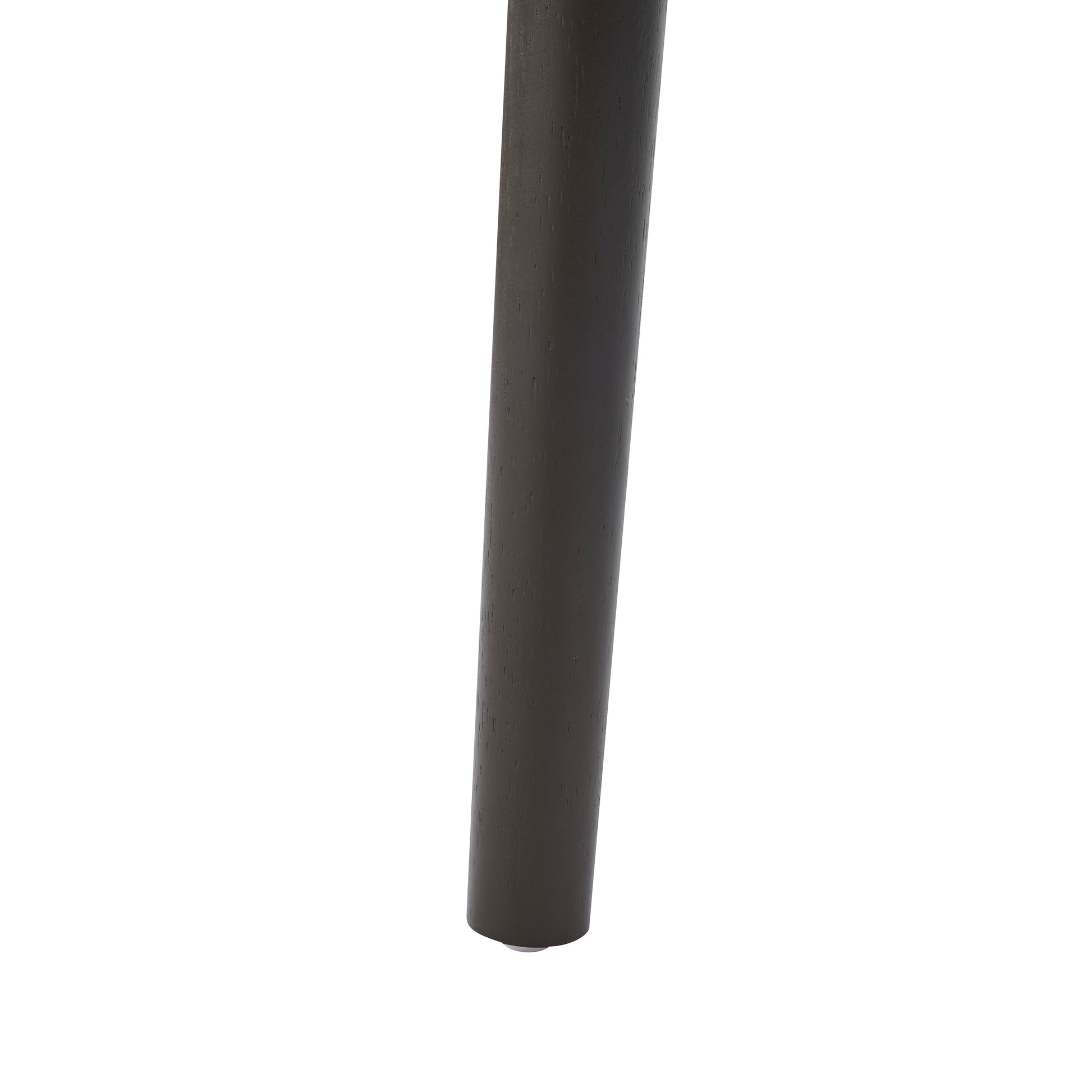Saimaa brown dining chair close-up of the black tapered leg and upholstered seat edge