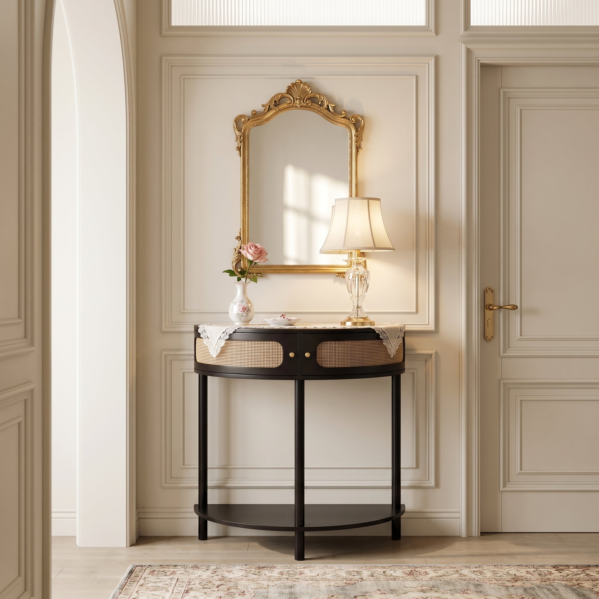 Saint black console table showing a modern entryway scene with mirror and floral decor