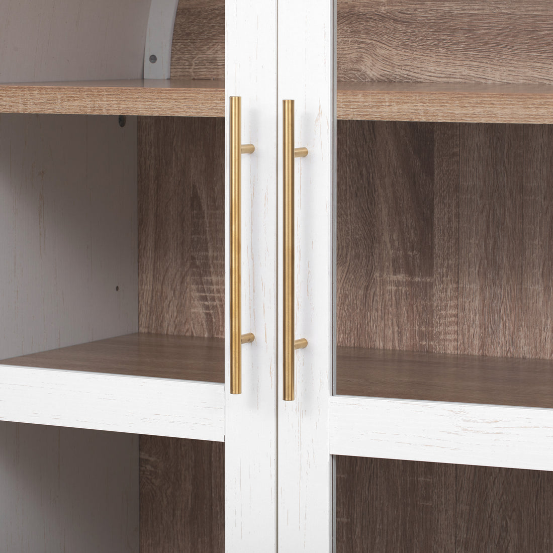 Savoy 71 inch white arched pantry cabinet glass door handle detail with gold metal pulls and wood grain interior shelves