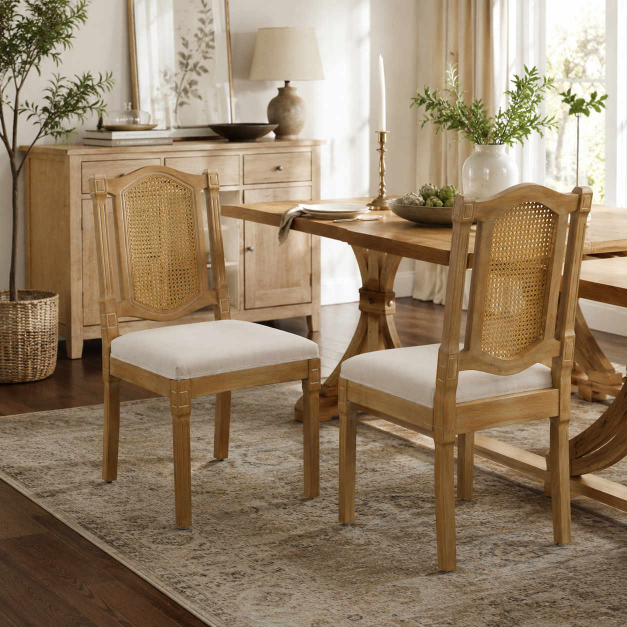 Shannon beige dining chairs showing a pair beside a wood dining table in a bright interior