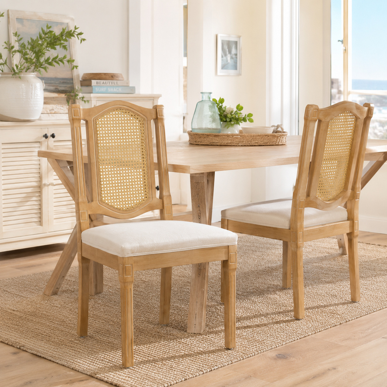 Shannon beige dining chairs showing four chairs around a round table in a sunlit dining area
