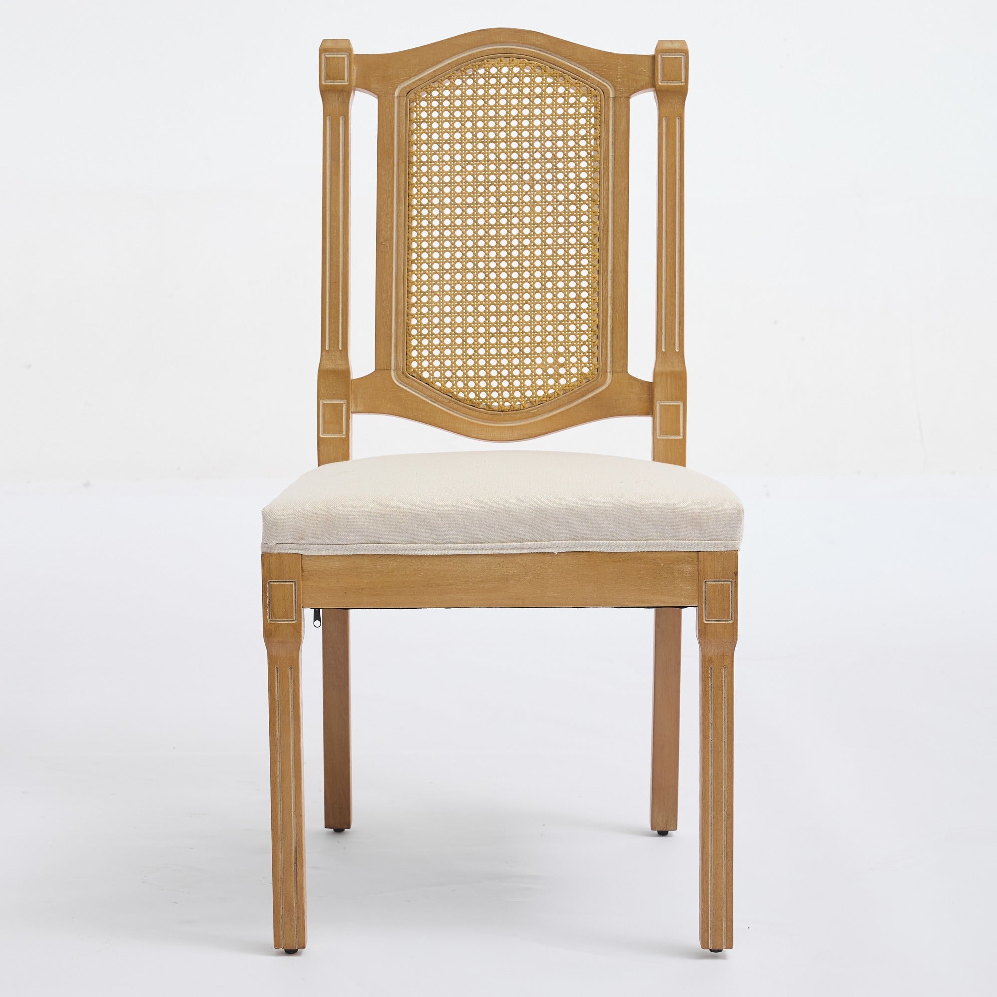 Shannon beige dining chair showing the front view with a woven cane back and linen seat