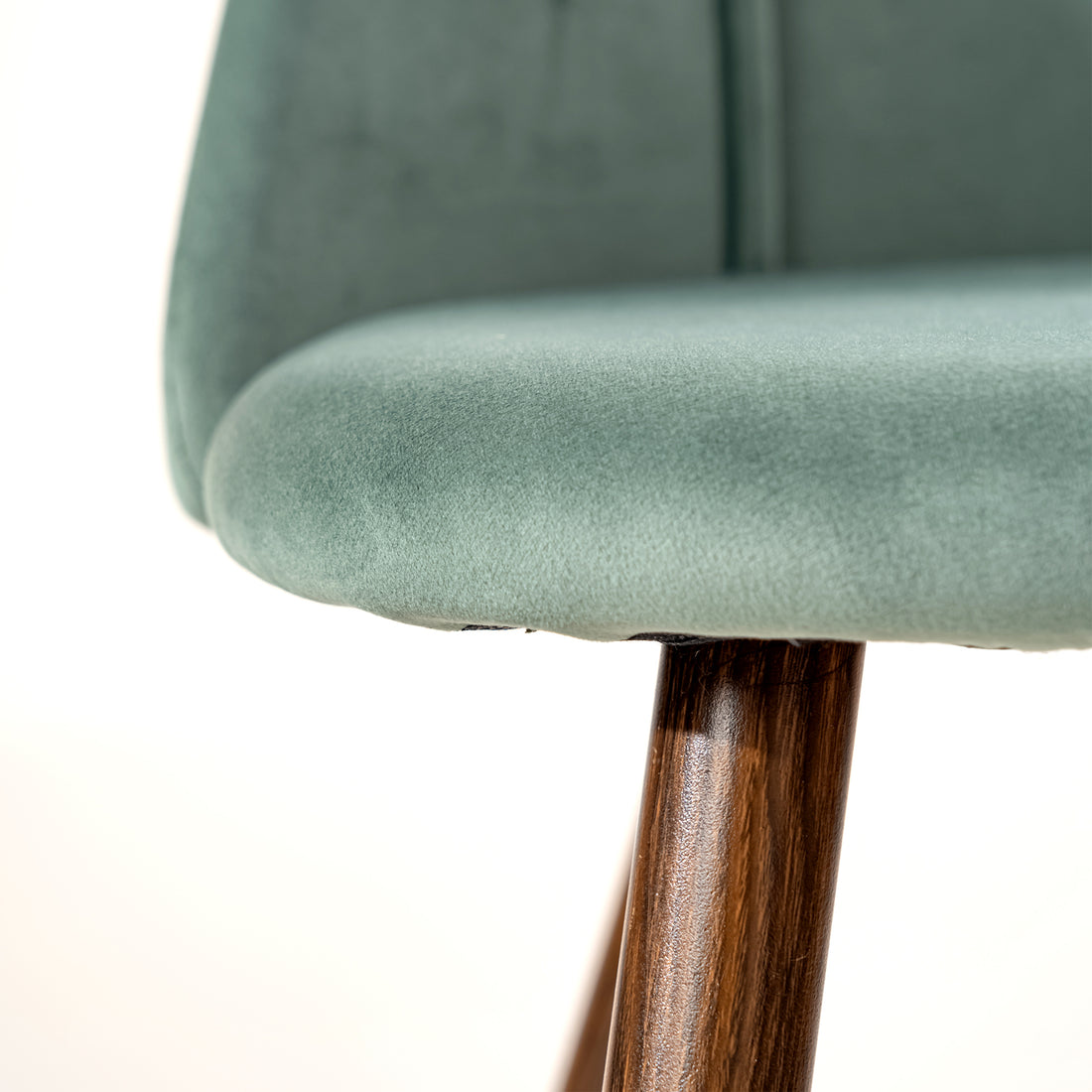 Smeg cactus green upholstered dining chair showing padded seat edge detail