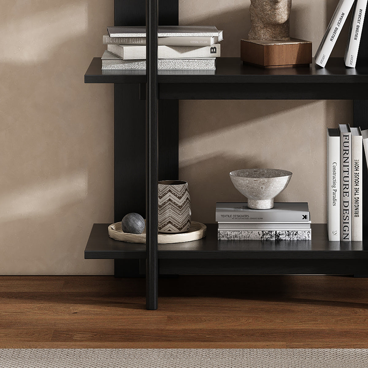 Sonnet black bookcase showing shelf corner and wood grain detail