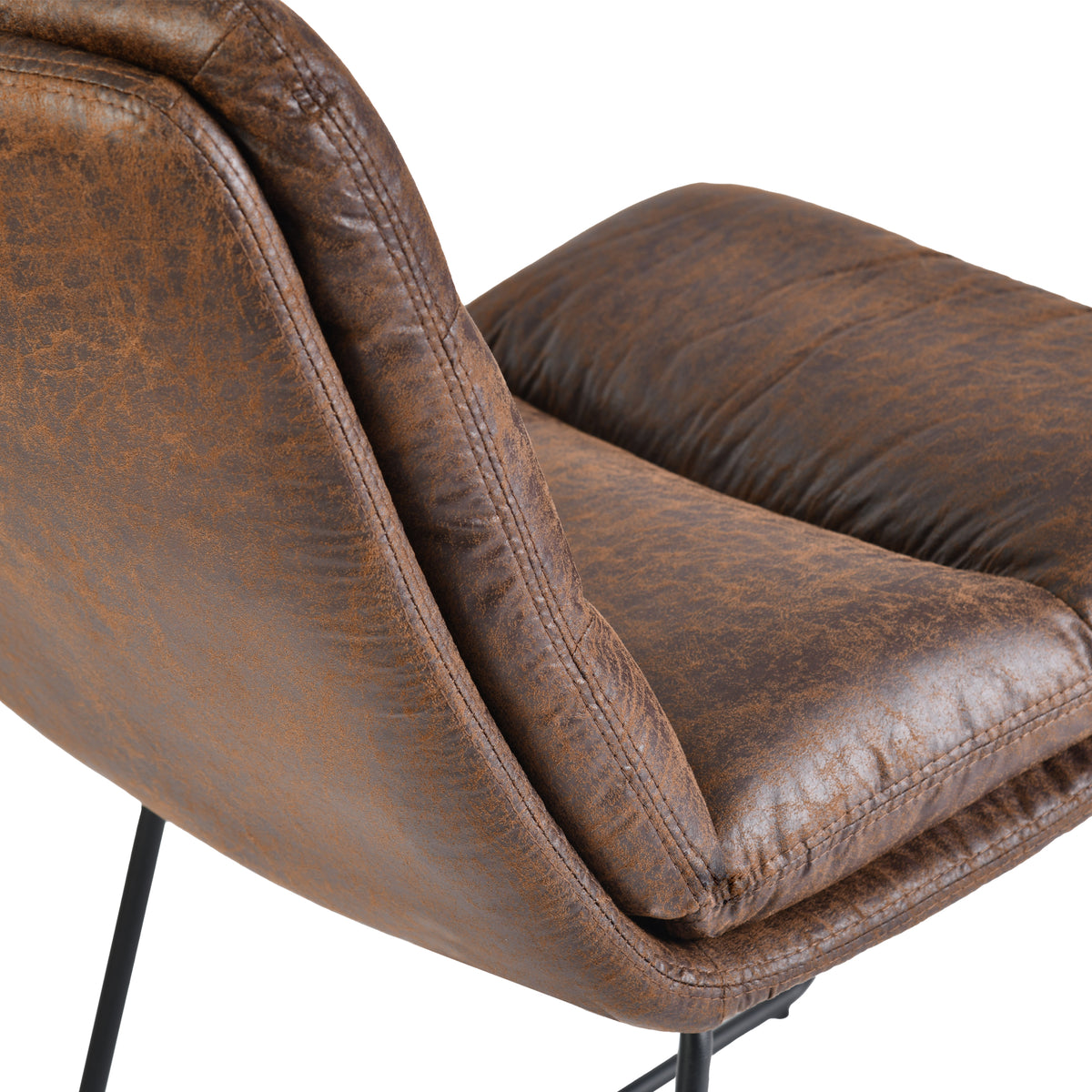 Steffen brown dining chair showing padded side profile detail