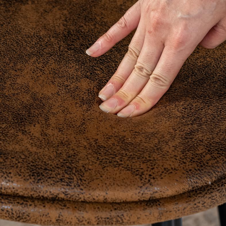 Sunflower suede brown dining chair showing soft suede upholstery texture detail