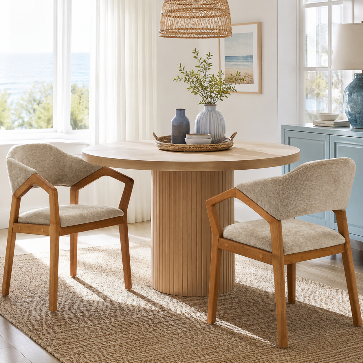 Taupo light oak dining chairs around a wood dining table in a bright dining room with natural light