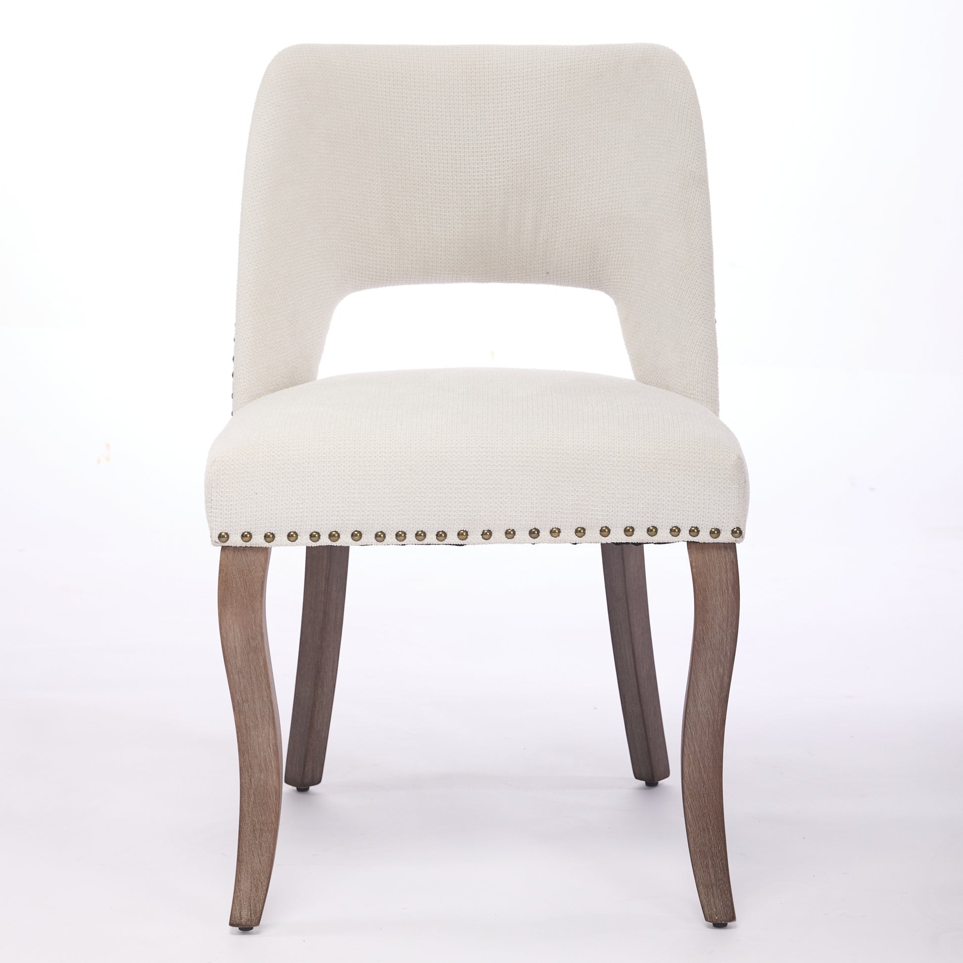 Tiberis beige dining chair showing the front view with an upholstered open cut-out back