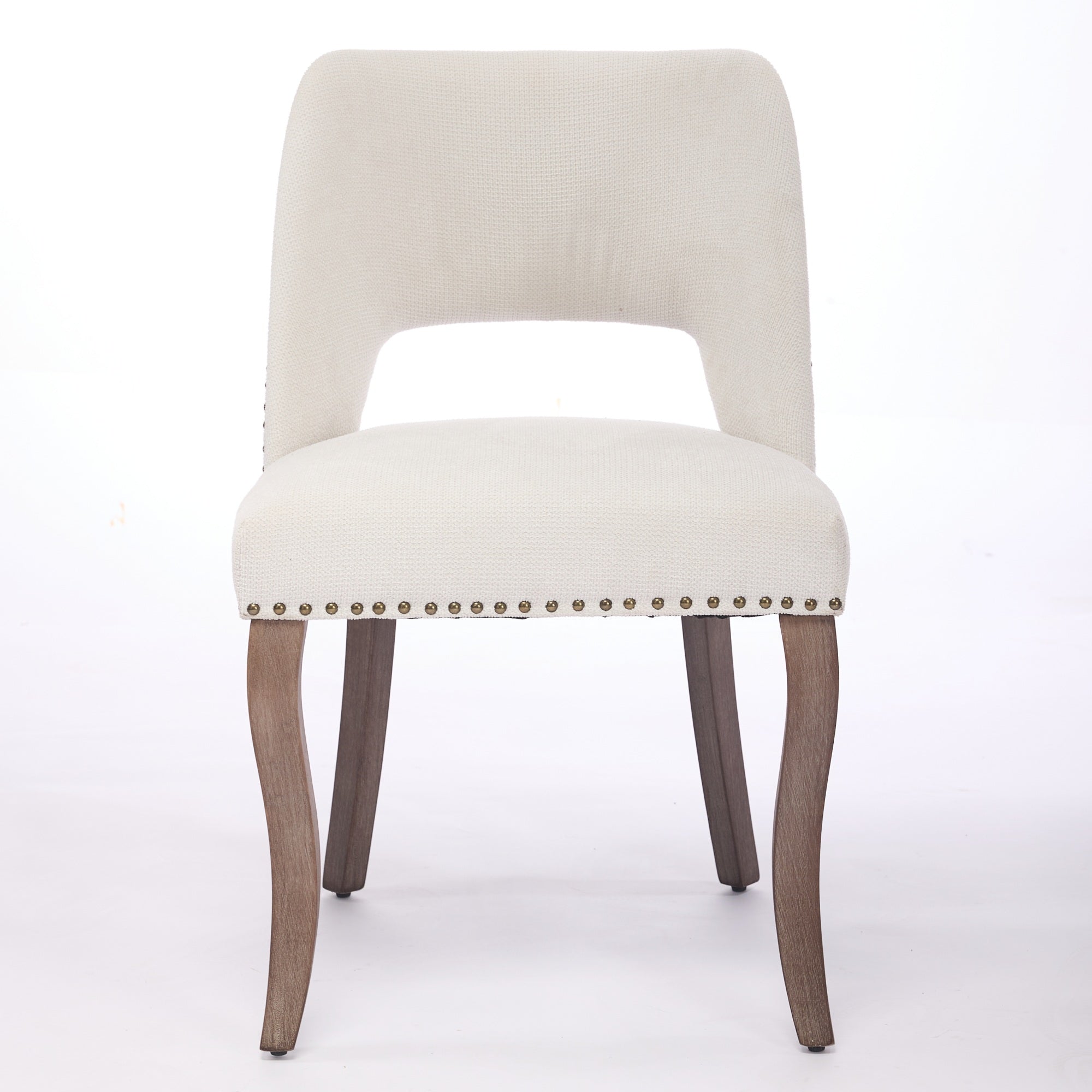 Tiberis beige dining chair showing the front view with an upholstered open cut-out back
