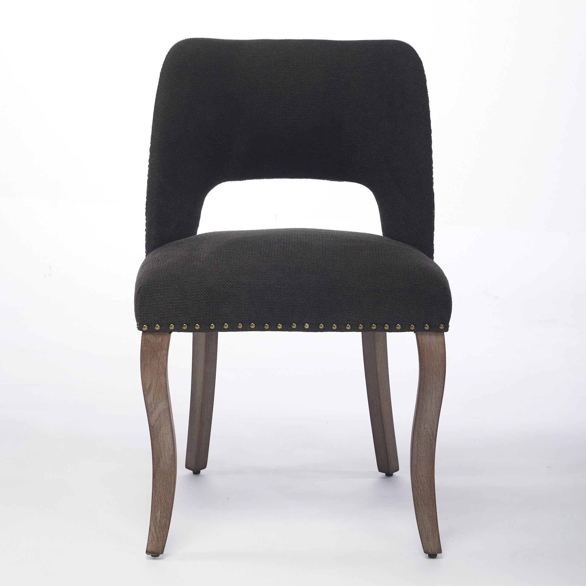 Tiberis black dining chair showing the front view with an upholstered open cut-out back