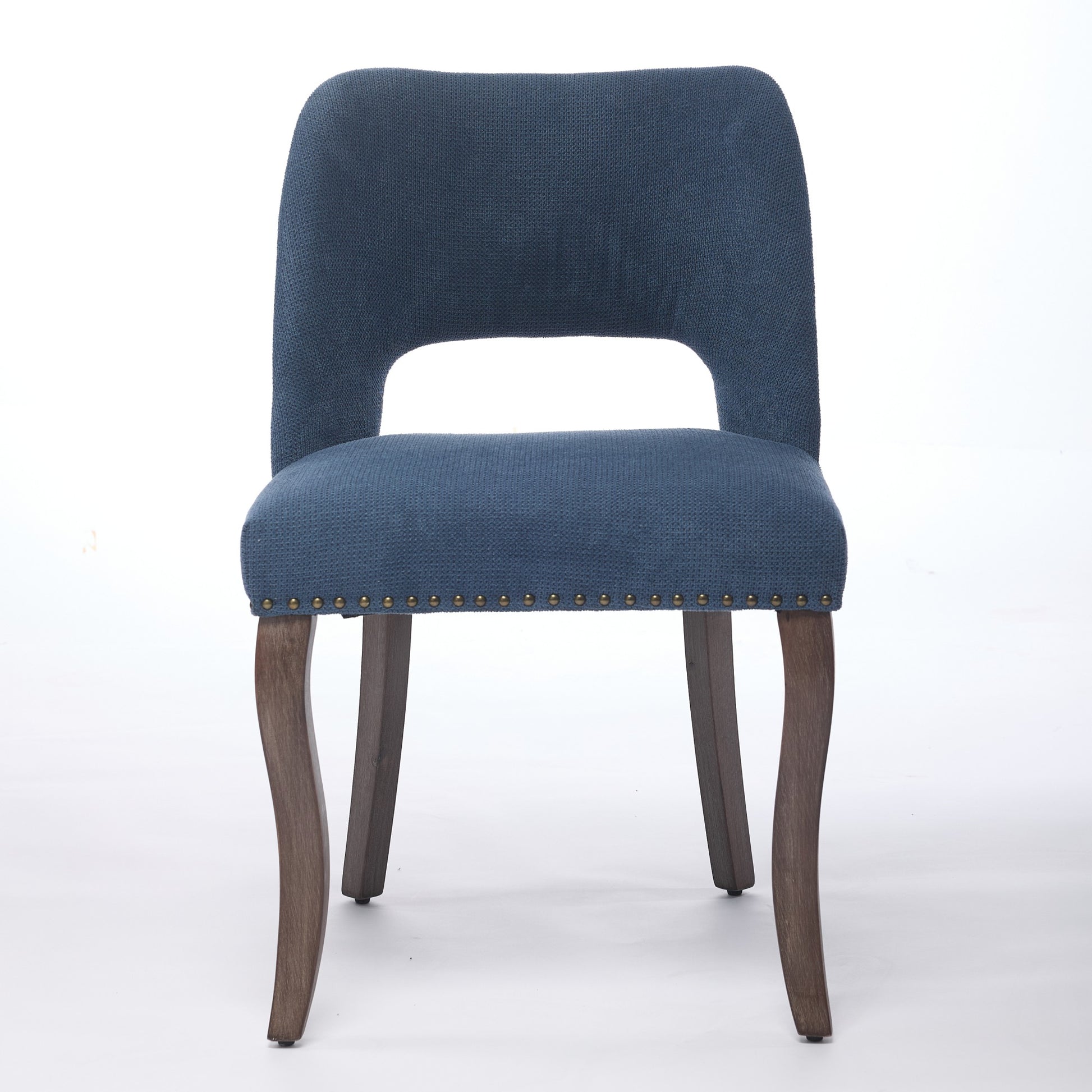 Tiberis blue dining chair showing the front view with an upholstered open cut-out back
