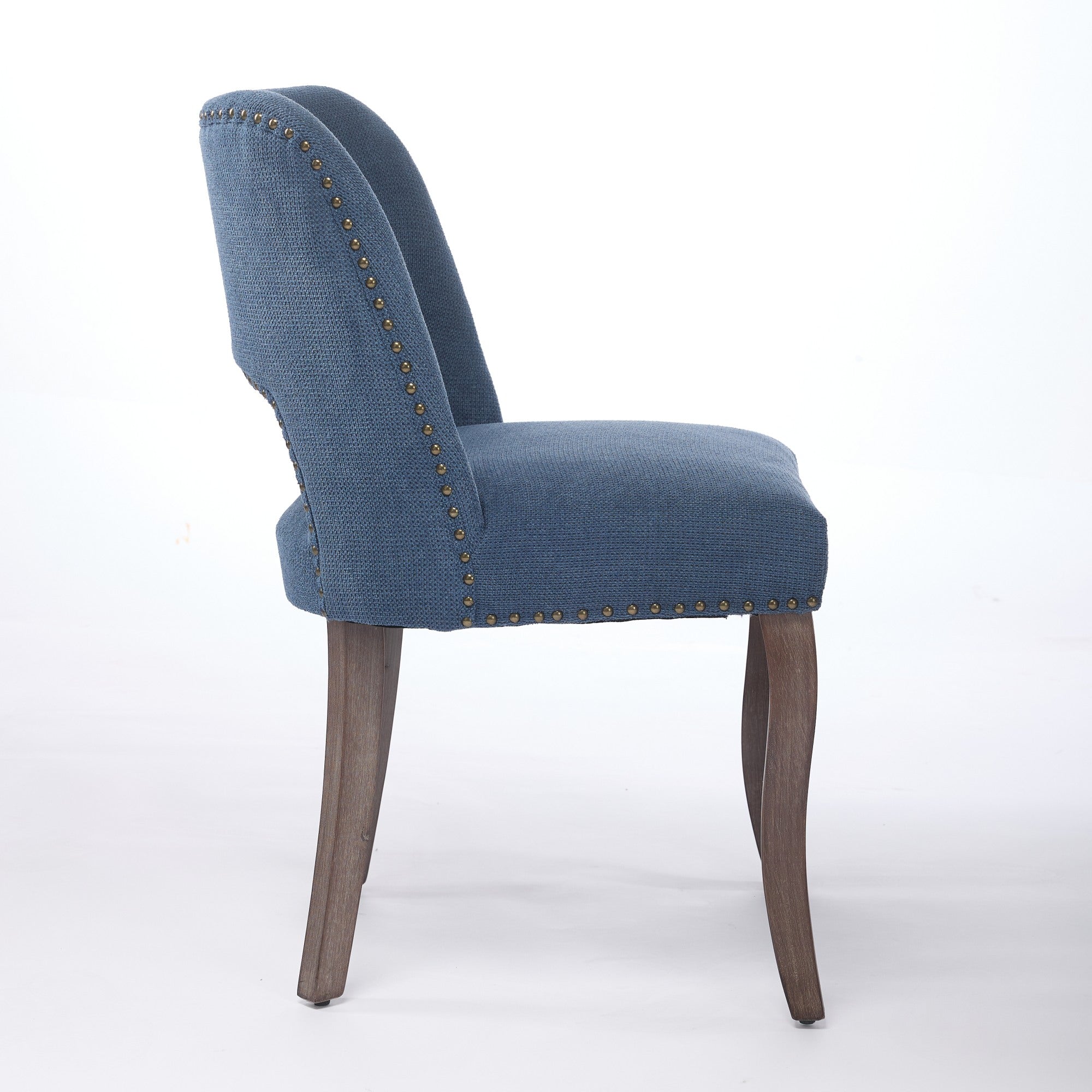 Tiberis blue dining chair showing the side profile with a curved back and tapered legs