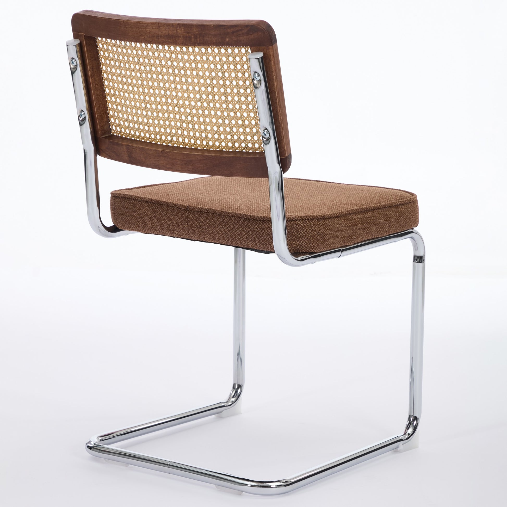 Tigris brown dining chair rear angled view with handwoven cane back on white background