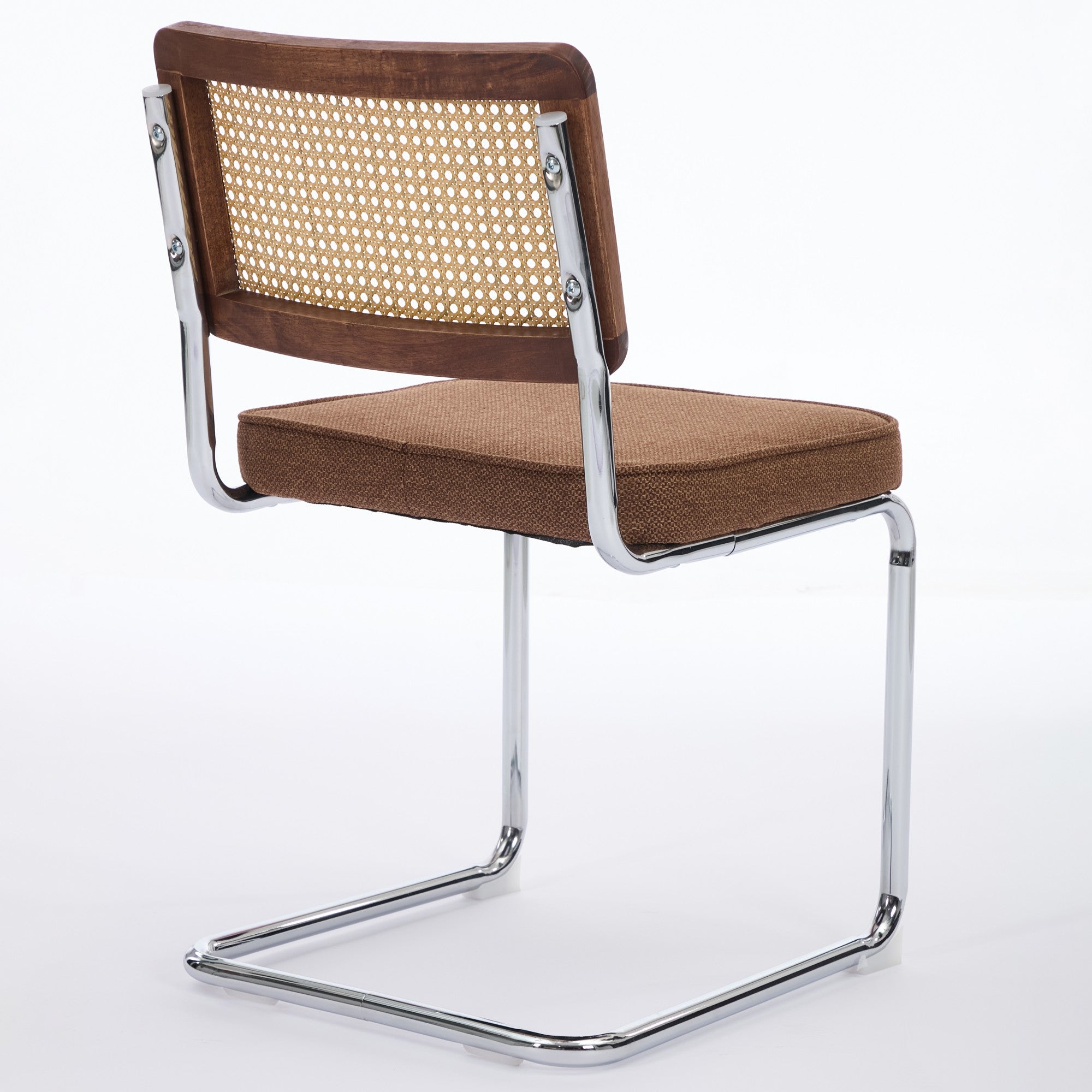 Tigris brown dining chair rear angled view with handwoven cane back on white background