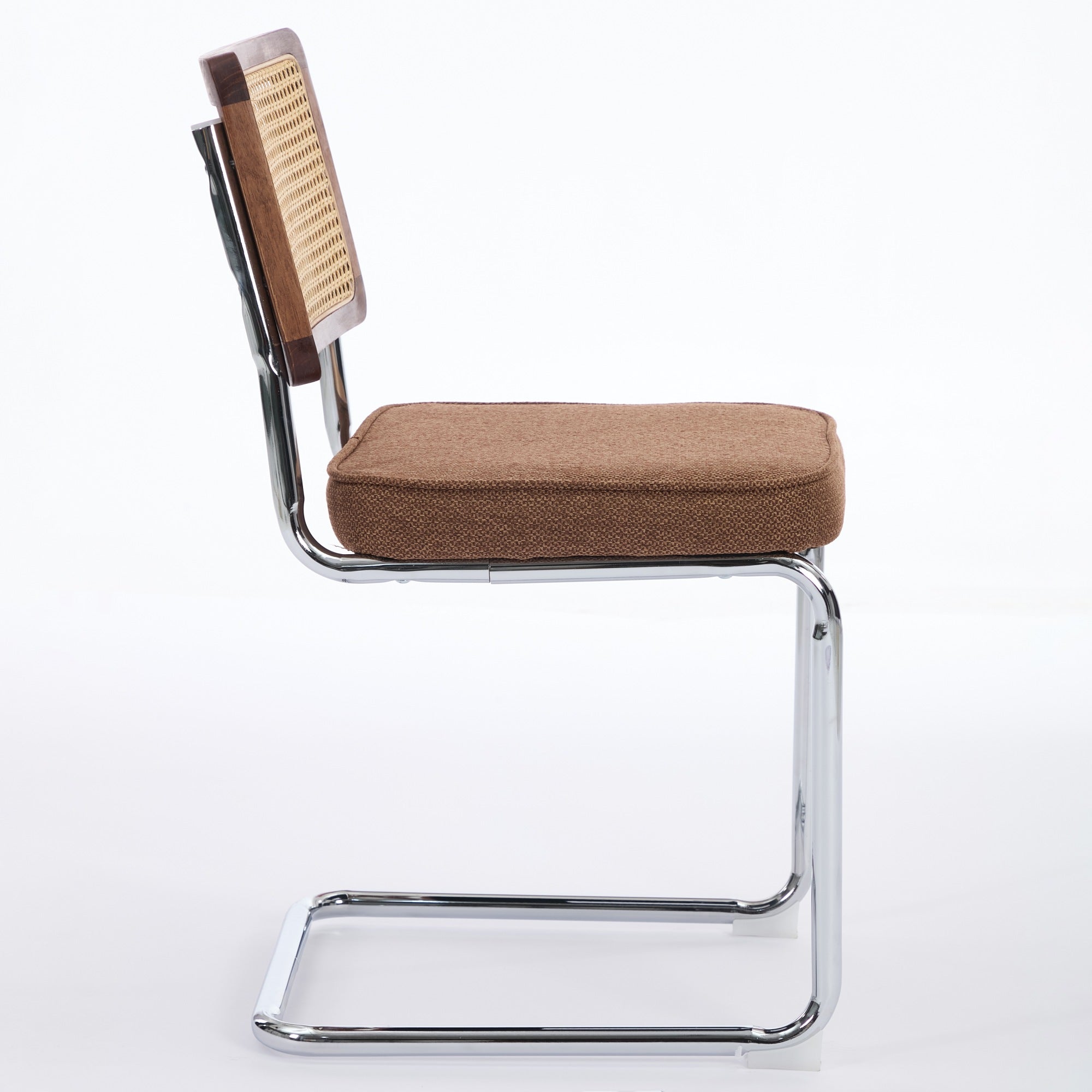 Tigris brown velvet cantilever dining chair side view on white background