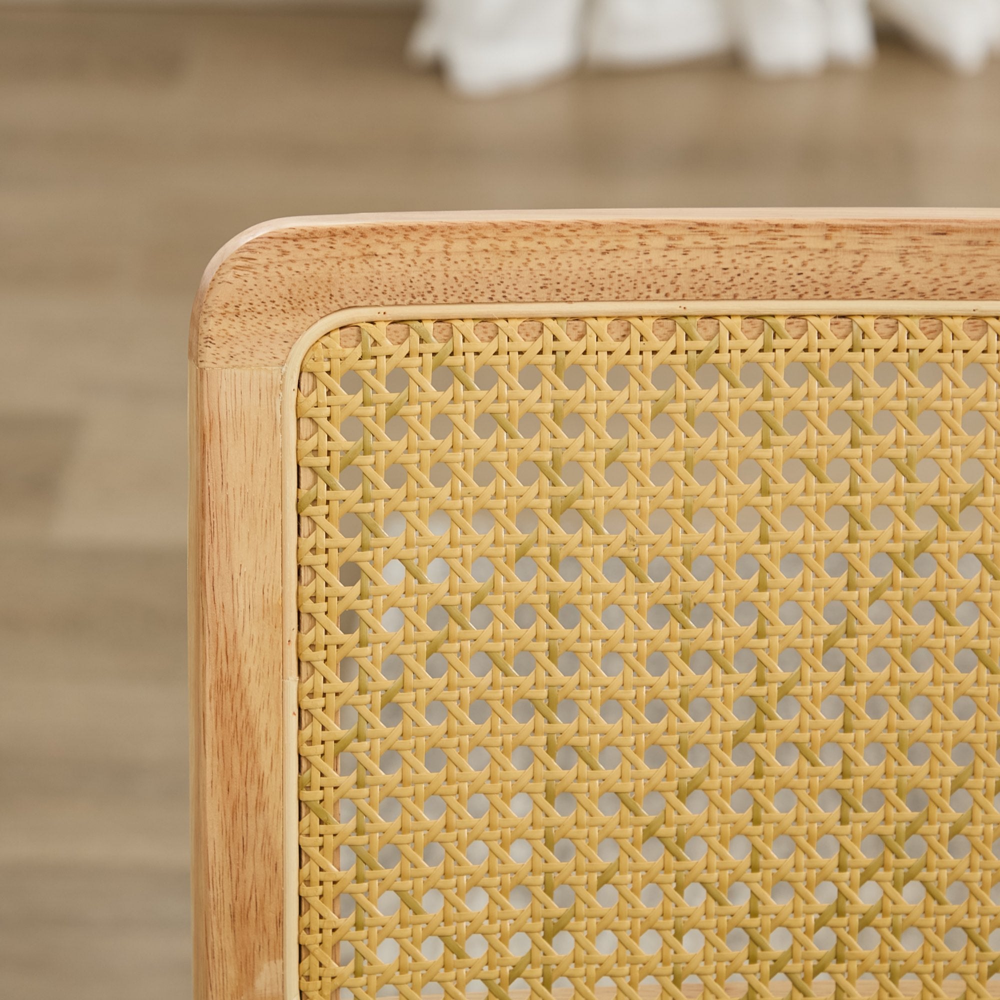 Tigris green dining chair close-up of the handwoven cane backrest and wood frame