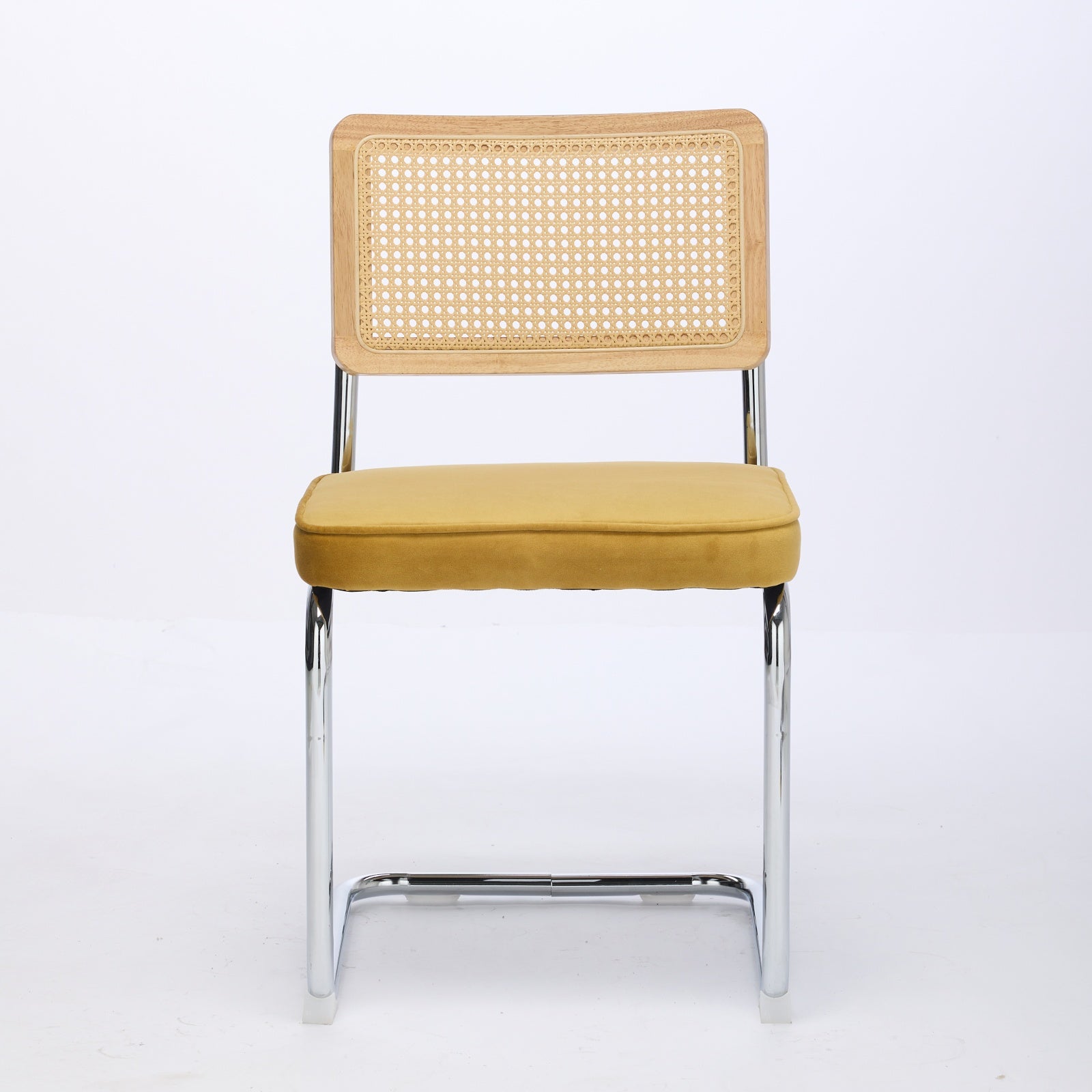 Tigris yellow velvet cantilever dining chair straight front view on white background