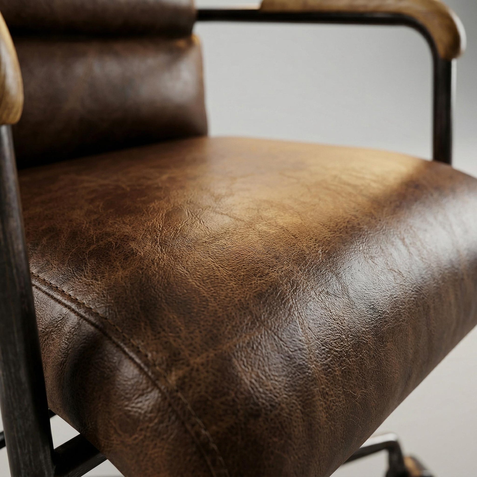 Torin brown office chair showing genuine leather upholstery detail
