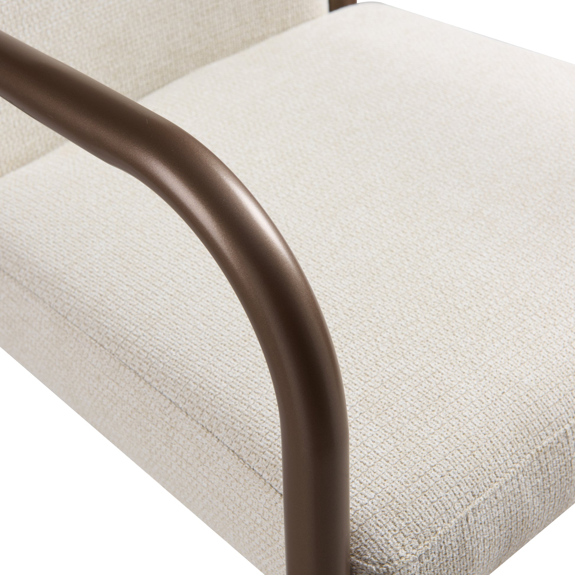 Trasimeno brown dining armchair close-up of the curved wood arm and upholstery