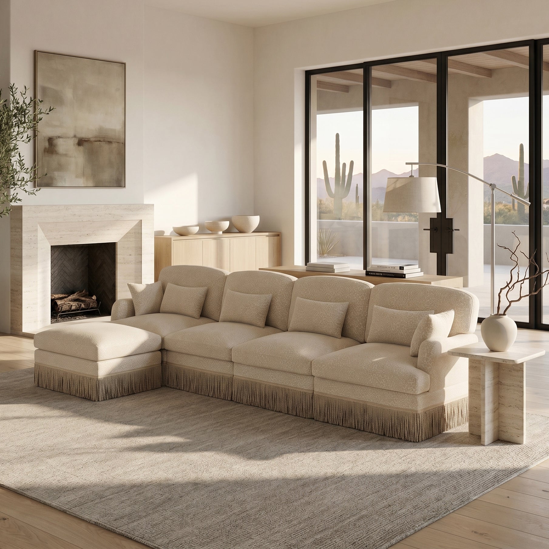 Tucson beige chenille sectional sofa with ottoman and fringe trim beside fireplace