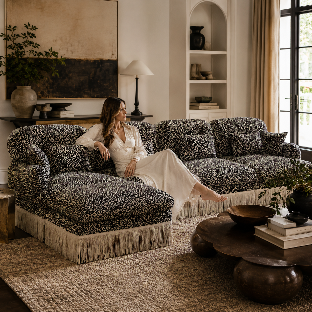 Tucson khaki grey leopard print sectional sofa with ottoman styled in a cozy living room