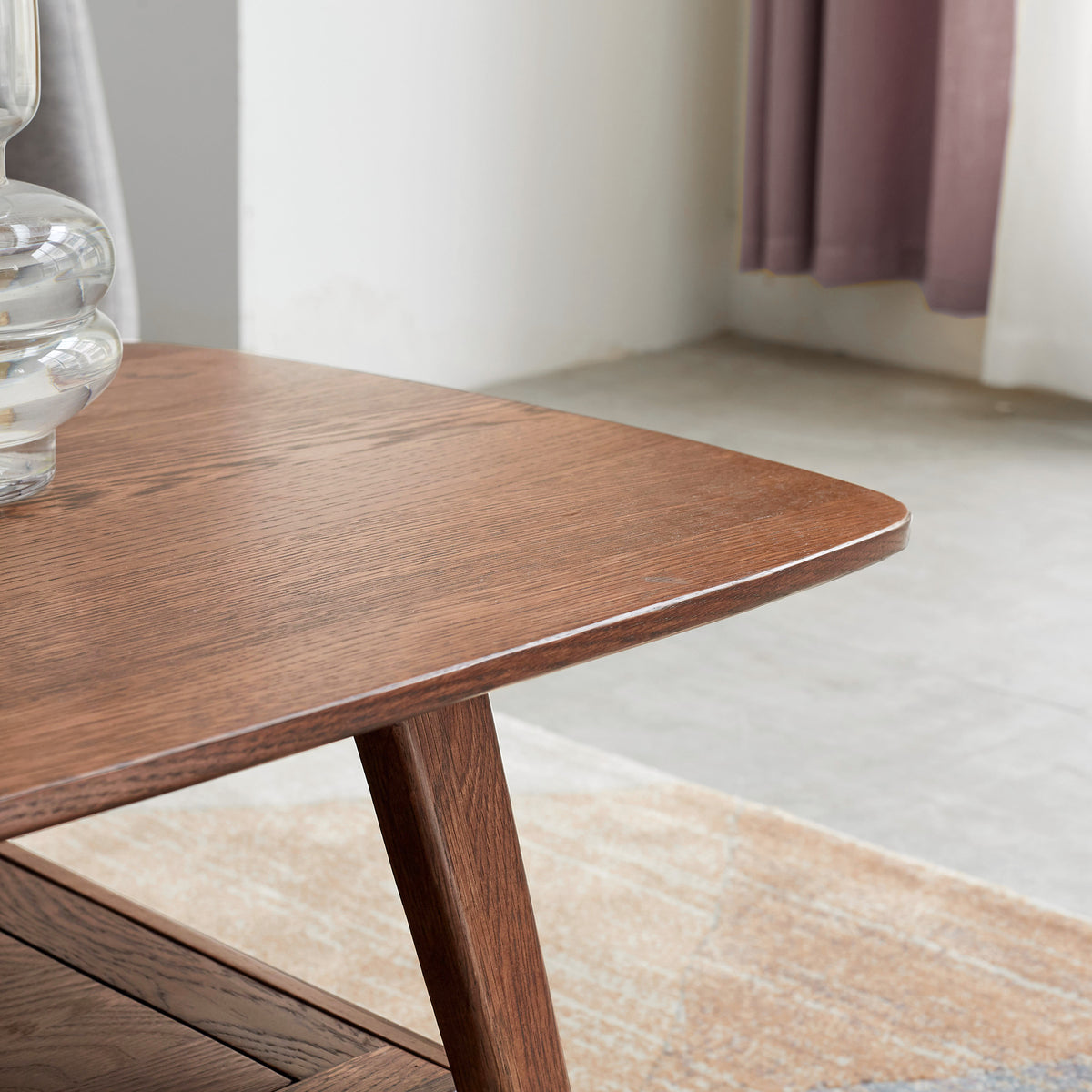 Tuscany walnut coffee table showing tabletop corner and side profile detail