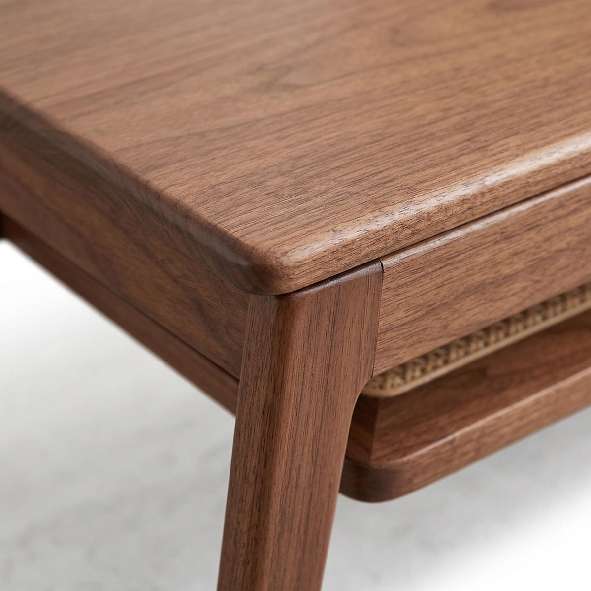 Tuscany walnut coffee table showing tabletop edge and frame joint detail