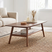 Tuscany walnut coffee table showing a rectangular table with storage shelf in a bright living room