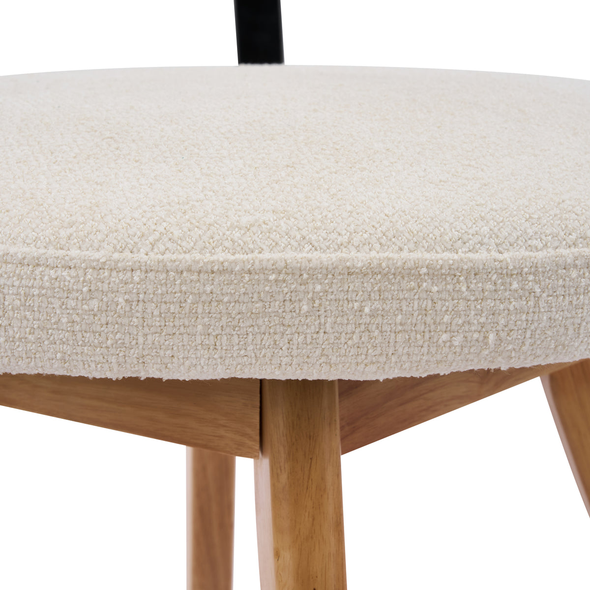 Vanern oak dining chair close-up of the curved upholstered backrest
