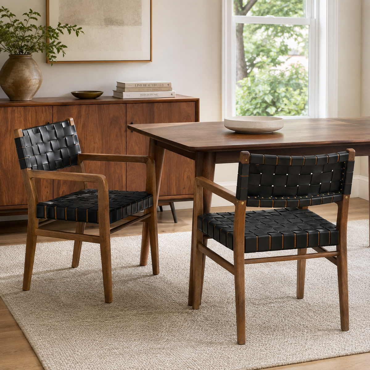 Vardar black dining chair showing a dining set in a warm dining room setting