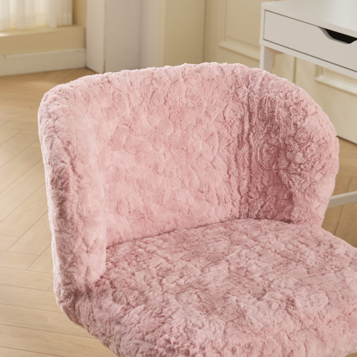 Velin pink office chair showing plush seat and back detail
