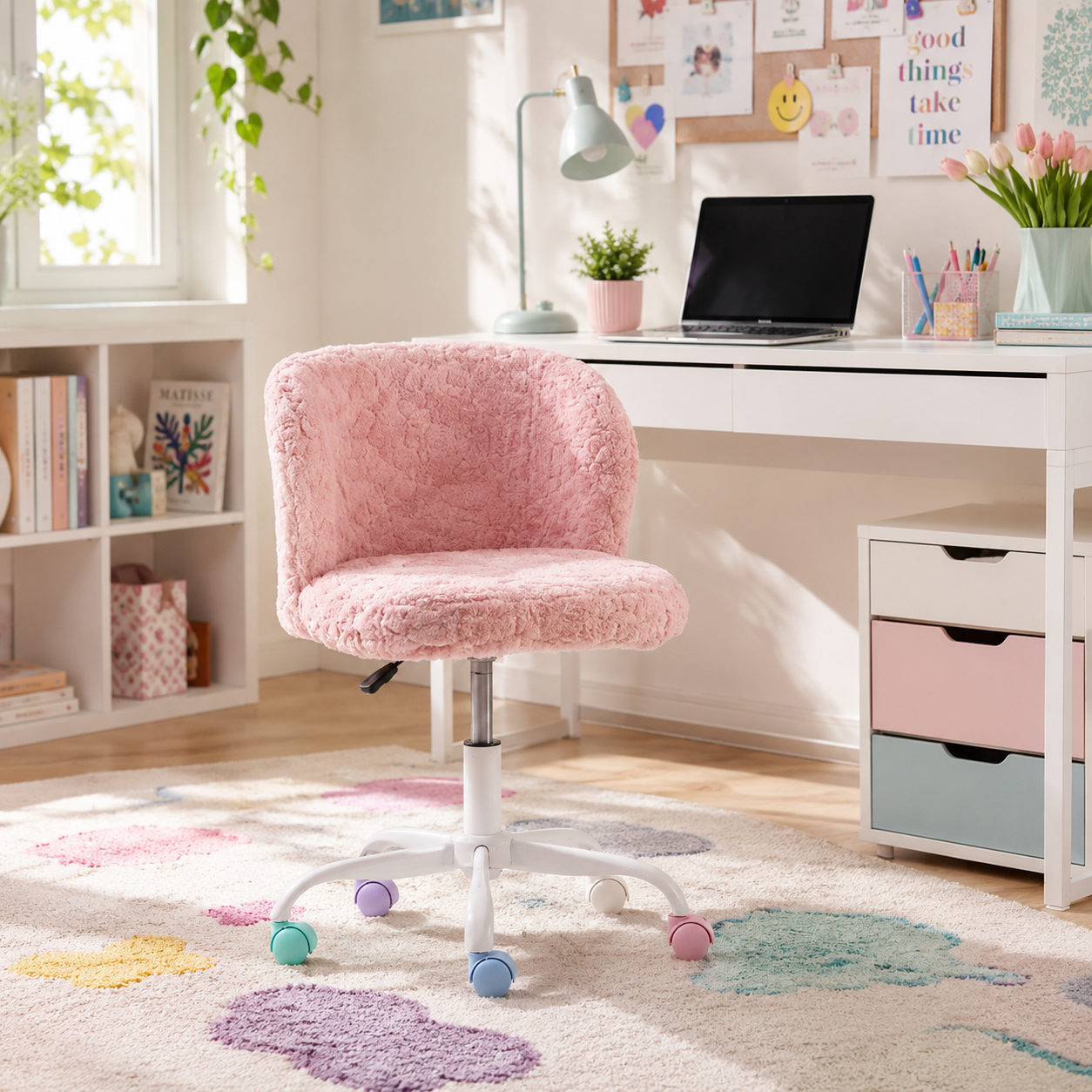 Velin pink faux fur swivel office chair with colorful casters in a bright home office