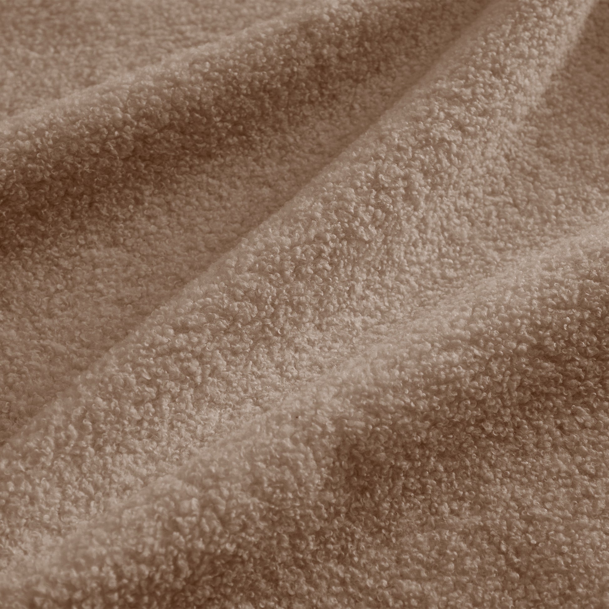 Ventura camel sectional sofa showing chaise and seat configuration detail