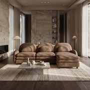 Ventura camel sectional sofa in modern living room with marble wall and floor-to-ceiling curtains