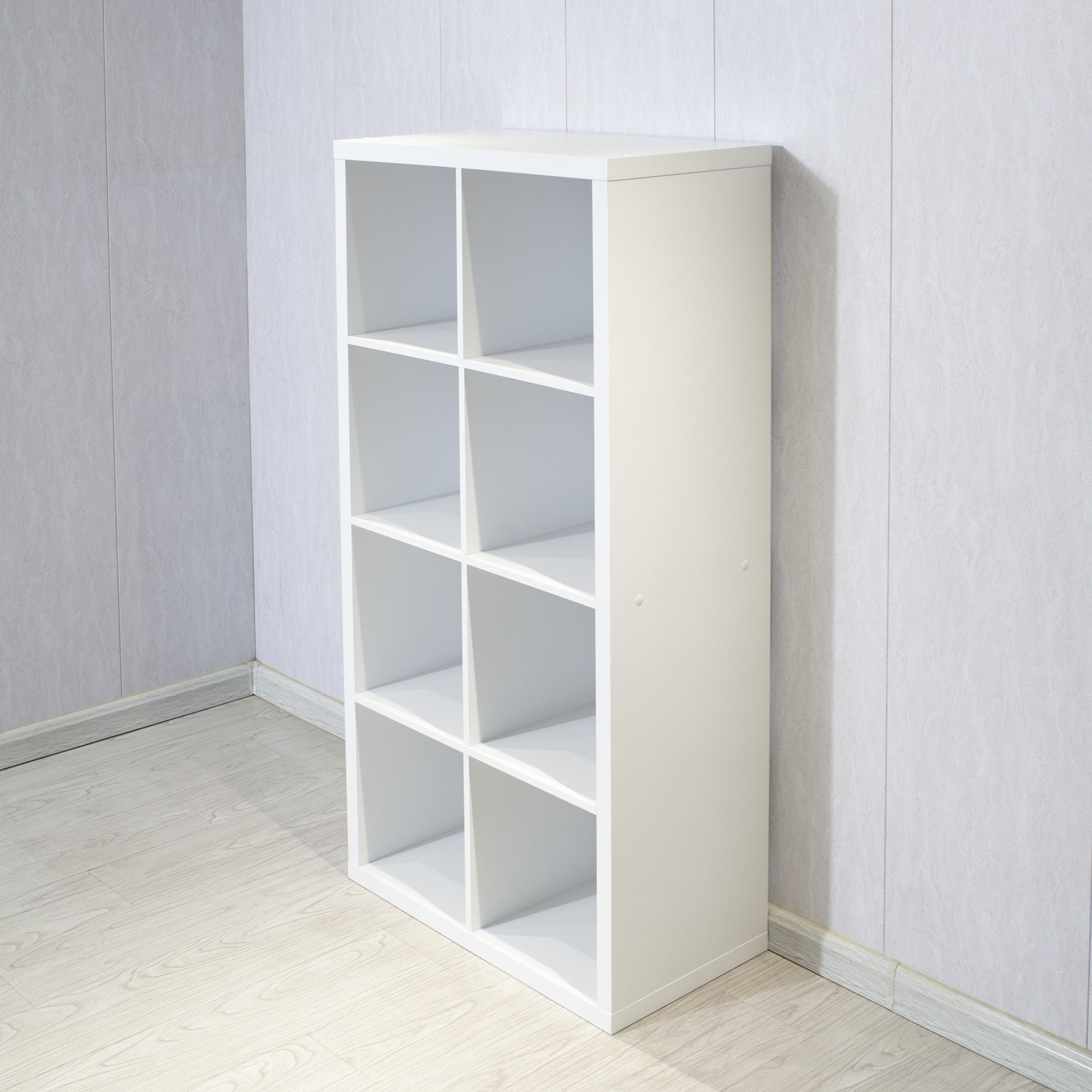 Verse white cube bookcase showing an angled view in the vertical eight-cube configuration